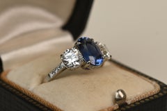 1.15 Carat Cushion Cut Sapphire Ring. Baguette Diamonds Accent Platinum Ring