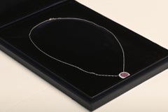 GIA 1.15 Carat Oval Cut Purplish red Ruby Pendant. Diamond Ruby Halo Platinum