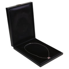 GIA 1.15 Carat Oval Cut Purplish red Ruby Pendant. Diamond Ruby Halo Platinum