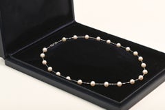 23 Freshwater pearls Necklace. Sectioned Pearls 14k White Gold Necklace