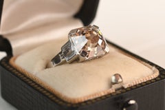 Art Deco GIA 5.50 Carat Asscher Cut Fancy Light Brown Ring. Platinum Ring VS2