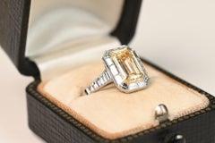 GIA 2 Carat Emerald Cut Yellow Diamond Ring. White Diamond Halo Platinum W-XSI1