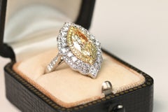 GIA 2ct Marquise Cut Light Yellow Diamond Ring. White Diamond Platinum W-X SI1