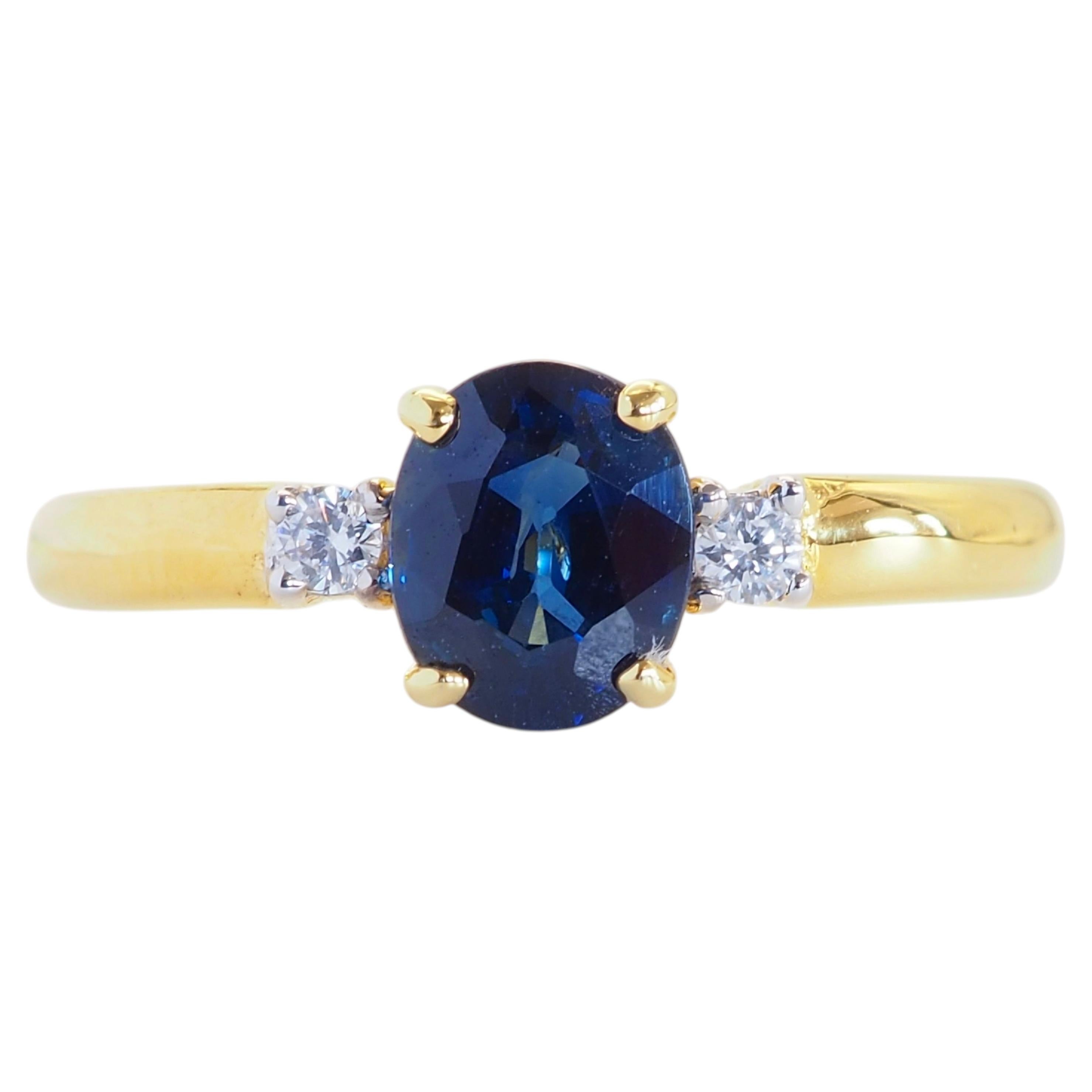 18K Gold 0.86ct Blue Sapphire & 0.07ct Diamond Three Stone Ring For Sale