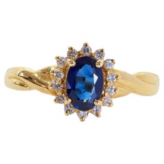 Anello con halo a raggi di sole in oro 18 carati con zaffiro blu ovale da 0,74 carati e diamante da 0,12 carati