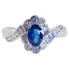 18K White Gold 0.60ct Oval Blue Sapphire & 0.40ct Diamond Halo Ring