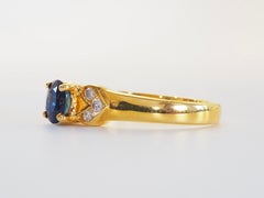 18K Gold 0.63ct Blue Sapphire & 0.10ct Diamond Ring