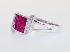 1990s 18K White Gold 0.80 Carats Ruby & 0.08ct Diamond Mystery Split-Shank Ring