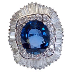 1980s 18K White Gold 7.04 Carats Blue Sapphire & 3.37ct Diamond Ballerina Ring