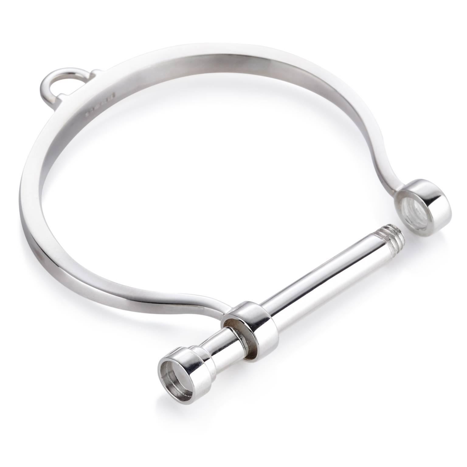 SINGLE SHACKLE BANGLE

This solid gold bangle is an excercise in subversive luxury - an area we revel in. Unscrewing across the top, as a shackle would, the bangle is a nod to restraint, with subtlety and sculptural elegance.  Also available in