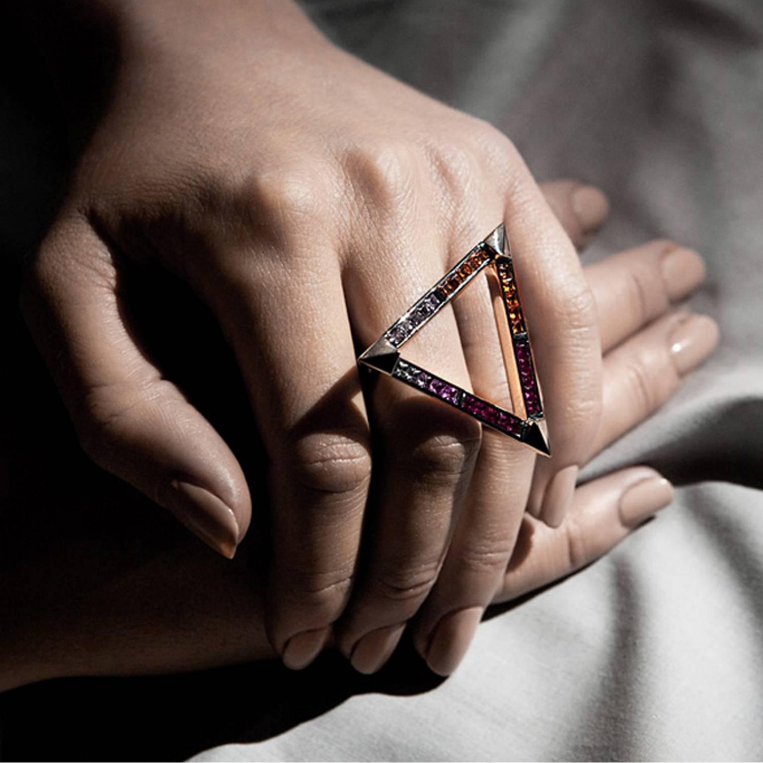 This ring is a truly unique showstopper in every way. Euphoric, blinding lights were behind the inspiration for this - the hero piece of the Shaman's Triangle collection. 

The triangle, an ancient symbol of esoteric power, has been finely mutated
