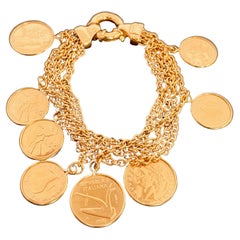 Bracelet de pièces de monnaie en or 18 carats composé de 5 rangées de chaînes avec 8 pièces de monnaie italiennes en or