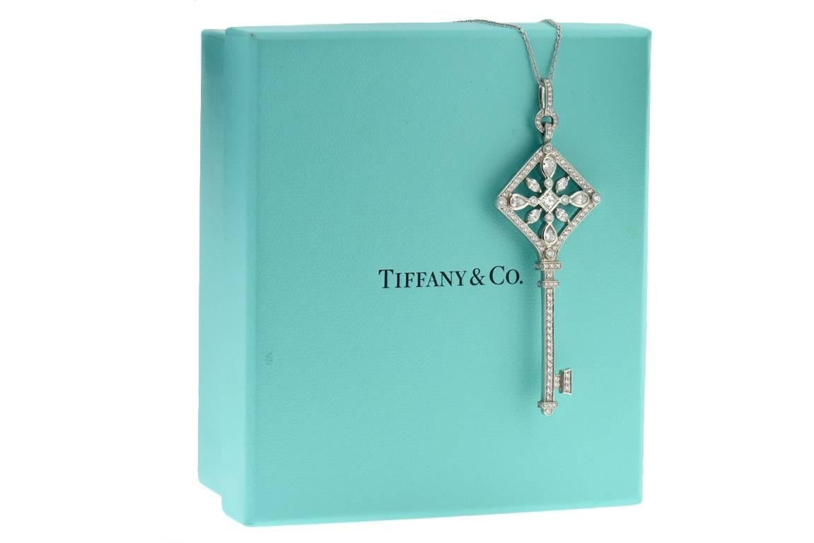 Tiffany & Co. Kaleidoscope Platinum & Diamond Key Pendant Necklace.
Platinum Key is encrusted Collection Quality Round, Marquise, Square & Pear Cut Diamonds with a total Combined Diamond Carat Weight of 1.51. 
Pendant measures 2