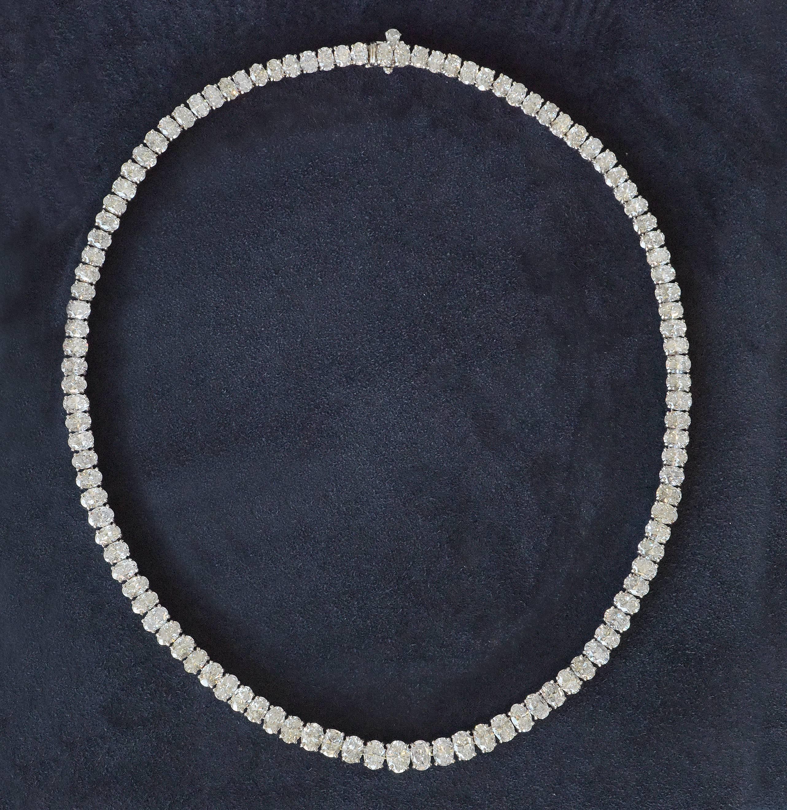  
From an estate of a lady; we offer a stunning Diamond necklace set in Platinum by Harry Winston. Necklace is set with beautifully matched faceted collection quality Oval diamonds, graduated.108 diamonds in total; weighing 34.35 carats. Originally