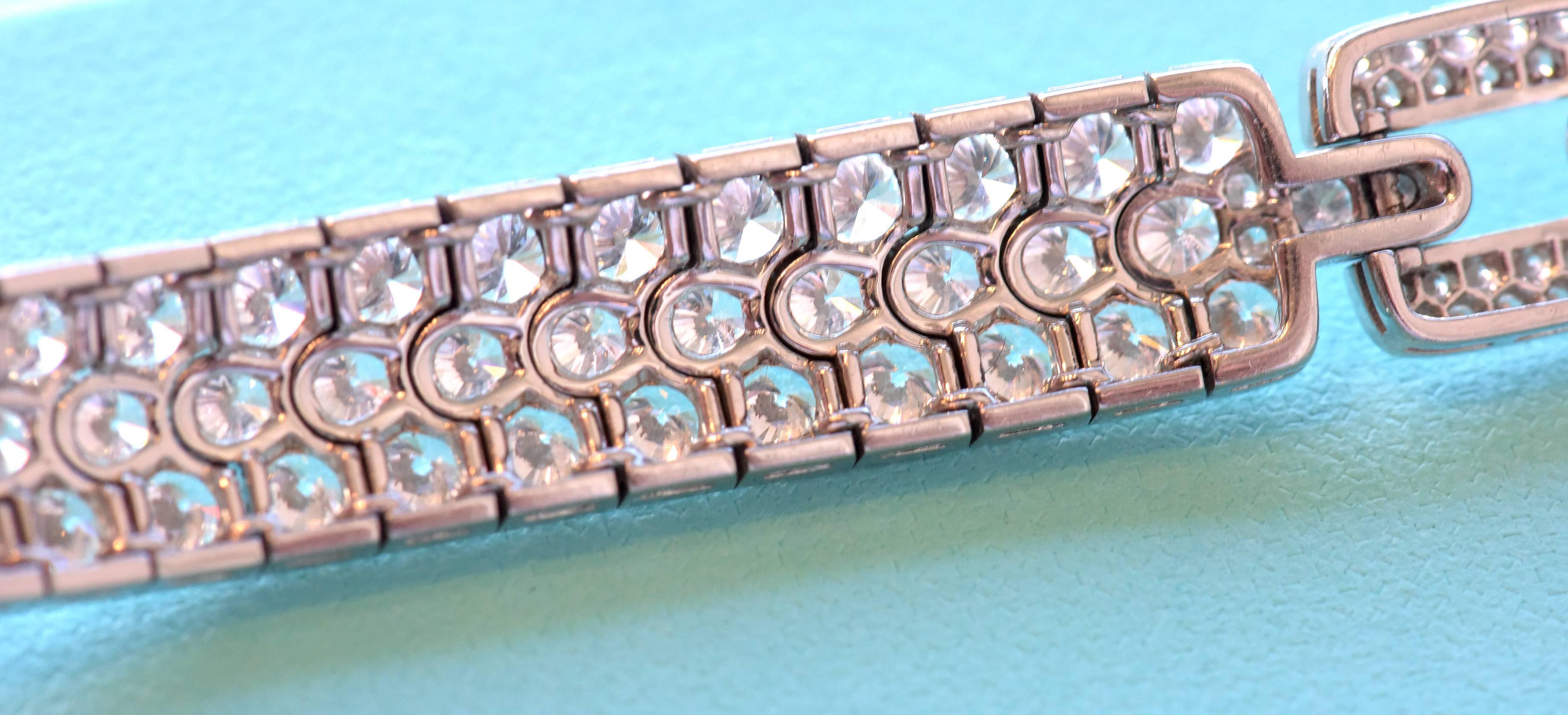 Estate of a lady; we offer an exceptional Tiffany & Co. Diamond & Platinum Bracelet. Set with approximately 17.40 Carats of Collection Quality Diamonds, Bead set in Three row sections with Three Bar Pave'd Links. Bracelet is complete with original