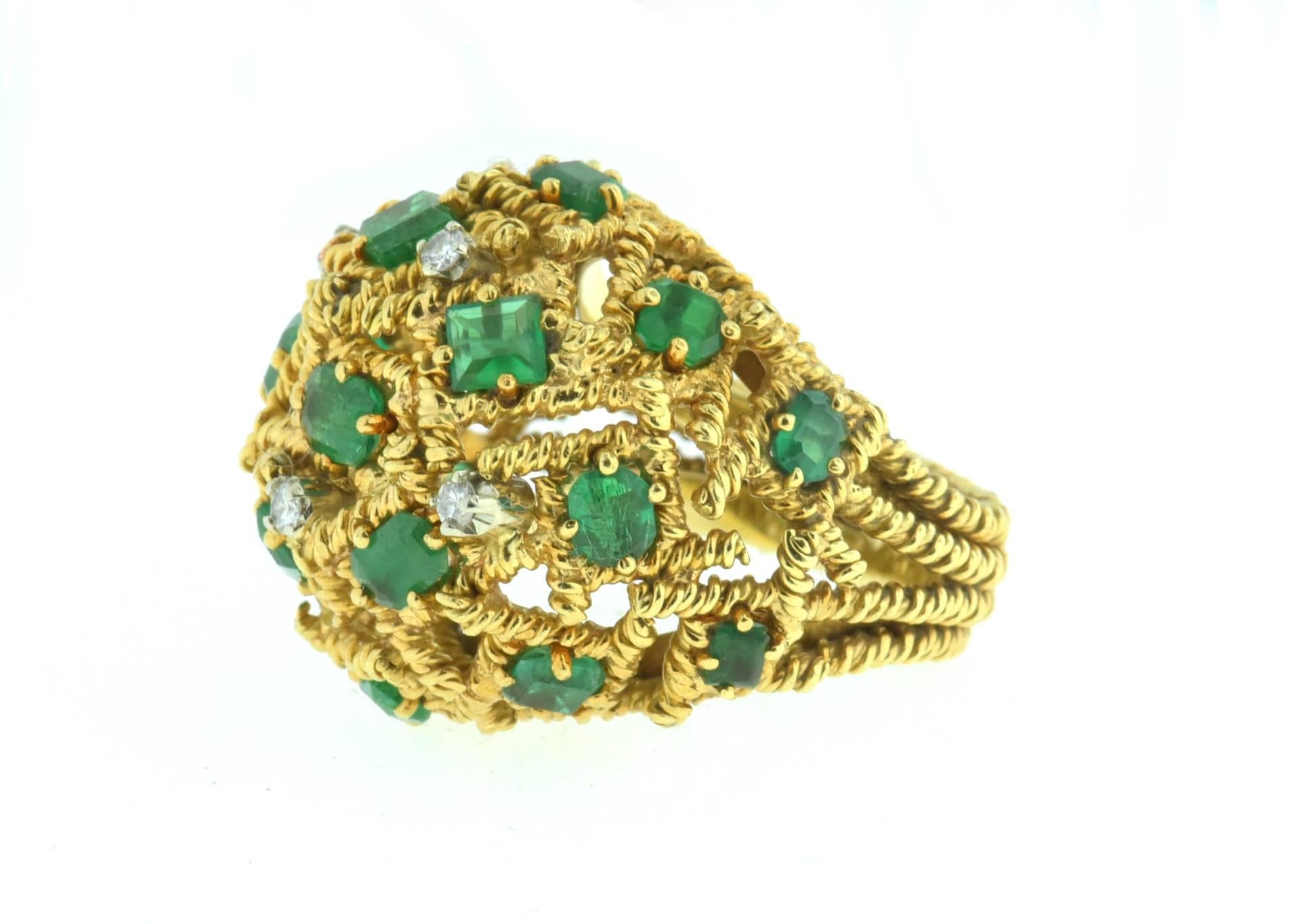 Fabulous Mid Century Modernist Italian Emerald, Diamond and Gold Dome Ring in 18K Yellow Gold, ring is set with various shapes and sizes of step cut emeralds in a perfect green color as well as 4 elegantly placed round diamonds. Currently fits a