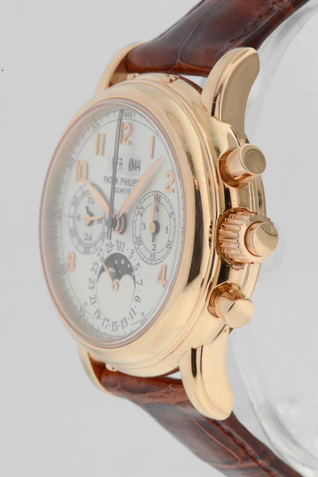 Gents rare Patek Philippe Perpetual Split Second Chronograph in 18K rose gold, Ref#5004R. On original strap with 18K rose gold tang buckle, crown with split depressor, solid and sapphire casebacks, case diameter 37mm. Manual winding movement,