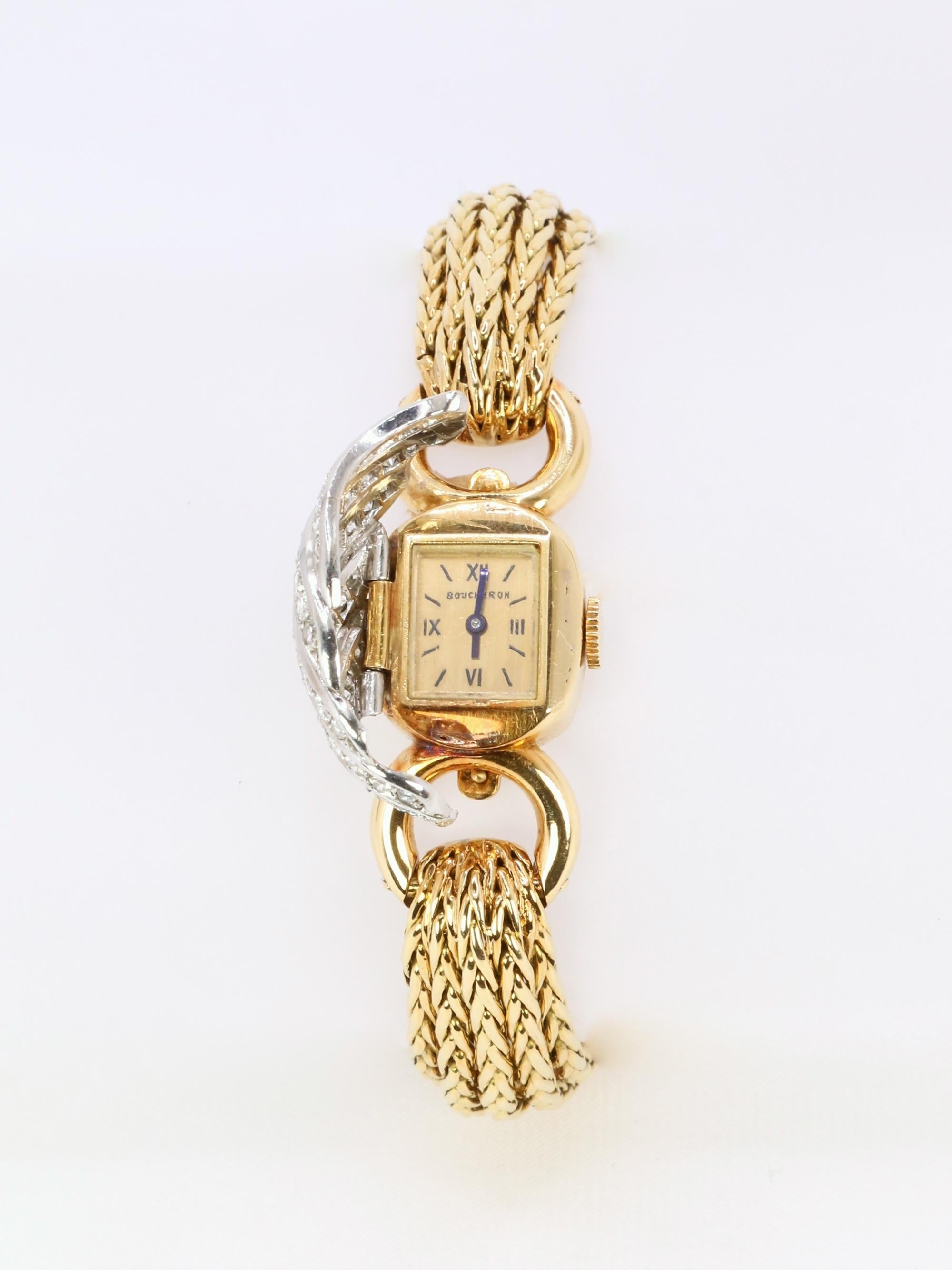 Rétro Montre secrète vintage en or jaune et diamants de Boucheron en vente