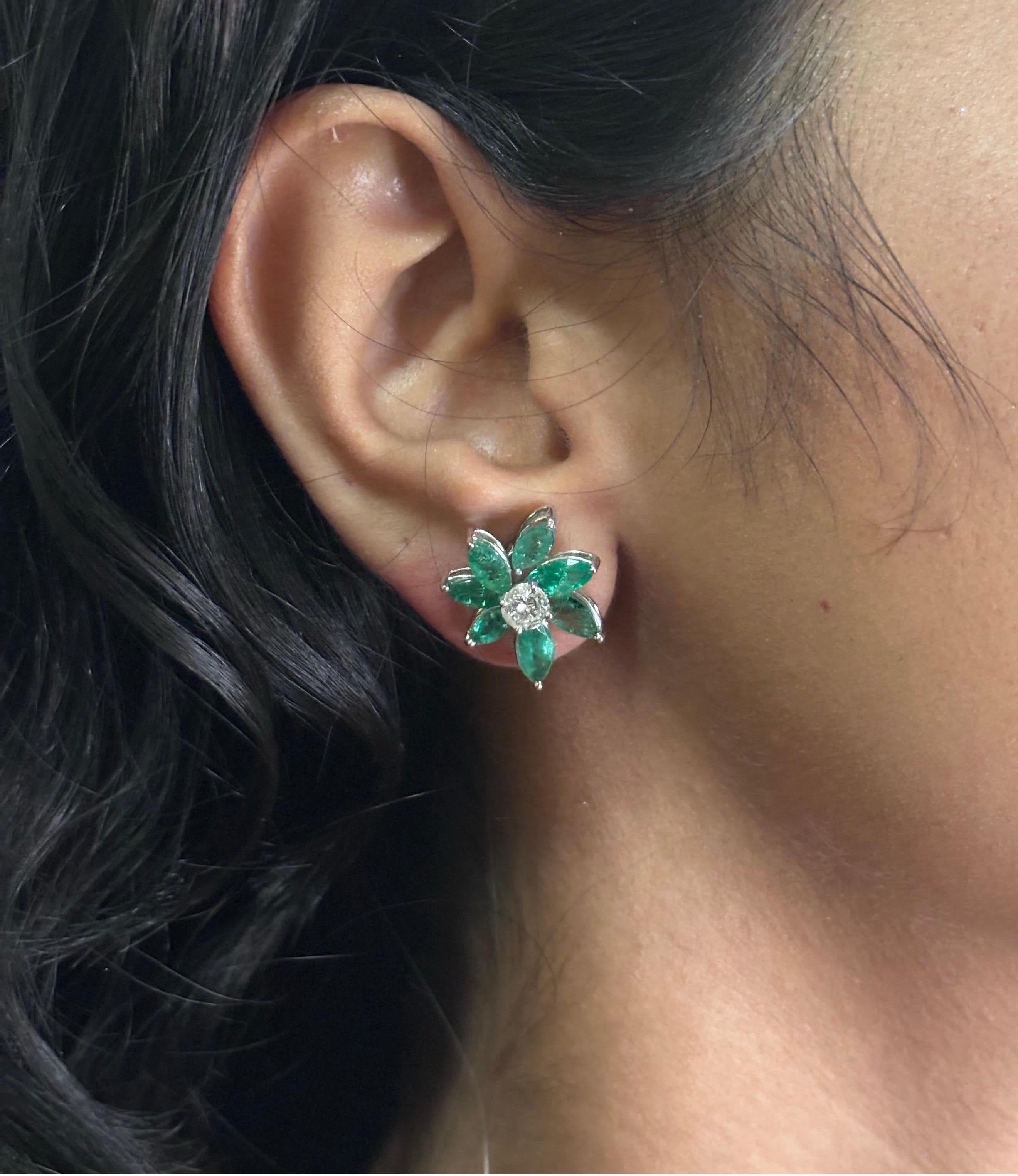 **Hallmarked with diamond weight and gold purity**

Add a pop of color to your jewelry collection with these stunning Natural Emerald and Diamond Stud Earrings from Alternative Jewellery. Crafted in 14K white gold, these earrings feature two natural