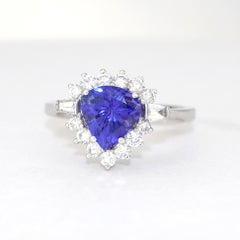18K White Gold Ring with Trillion-Cut Tanzanite & Diamond Halo, New