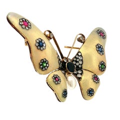 Broche vintage en forme de papillon en or jaune 18 carats, sertie de saphirs, de rubis, d'émeraudes et de diamants