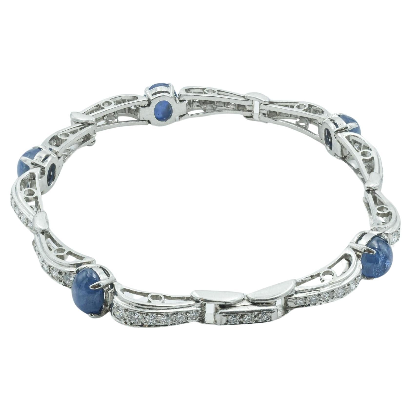 This bracelet is a splendid example of Platinum Art Deco jewelry, embodying the sophistication and elegance of the era. It features a series of captivating star sapphires, totaling approximately 3.95 carats, each exhibiting the unique asterism or