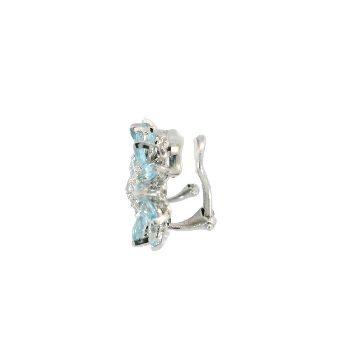 Orecchini di diamanti Asprey Topazio Girasole in oro bianco 18 carati a clip

Questi eleganti orecchini a clip presentano topazi blu taglio marquise per un totale di 6,44 carati, disposti in un grazioso motivo floreale. Al centro, un gruppo di