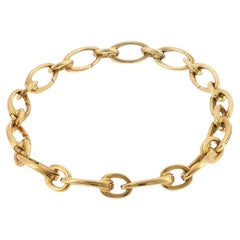 Tiffany & Co. 18K Clasping Charm Bracelet Yellow Gold 13 Charm Links 7.25"