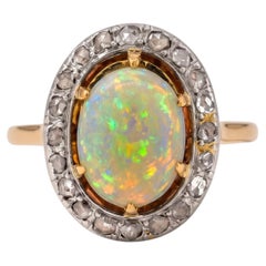 Bague vintage victorienne en or 18 carats et platine, avec monture « halo » — opale australienne de 1,5 carat, diamants