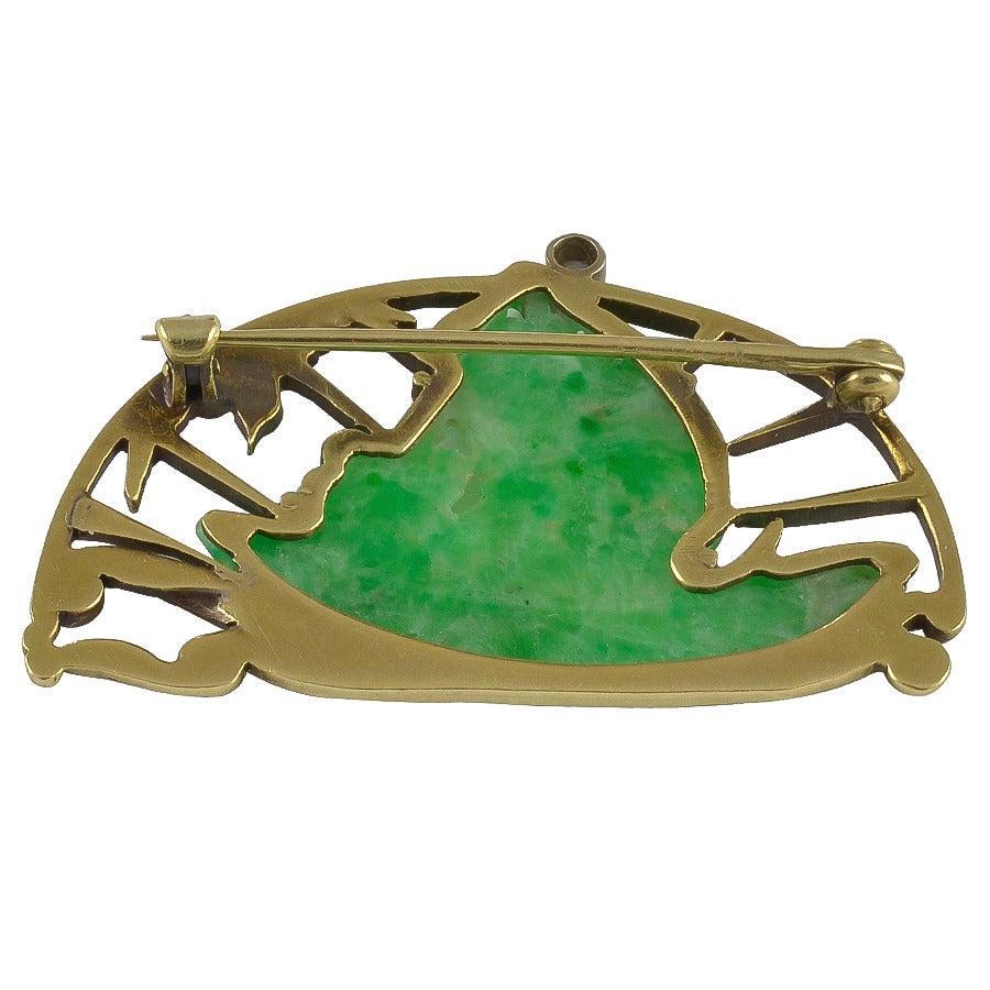 A stylish Art Deco Jade, Diamond, Gold and Enamel Brooch