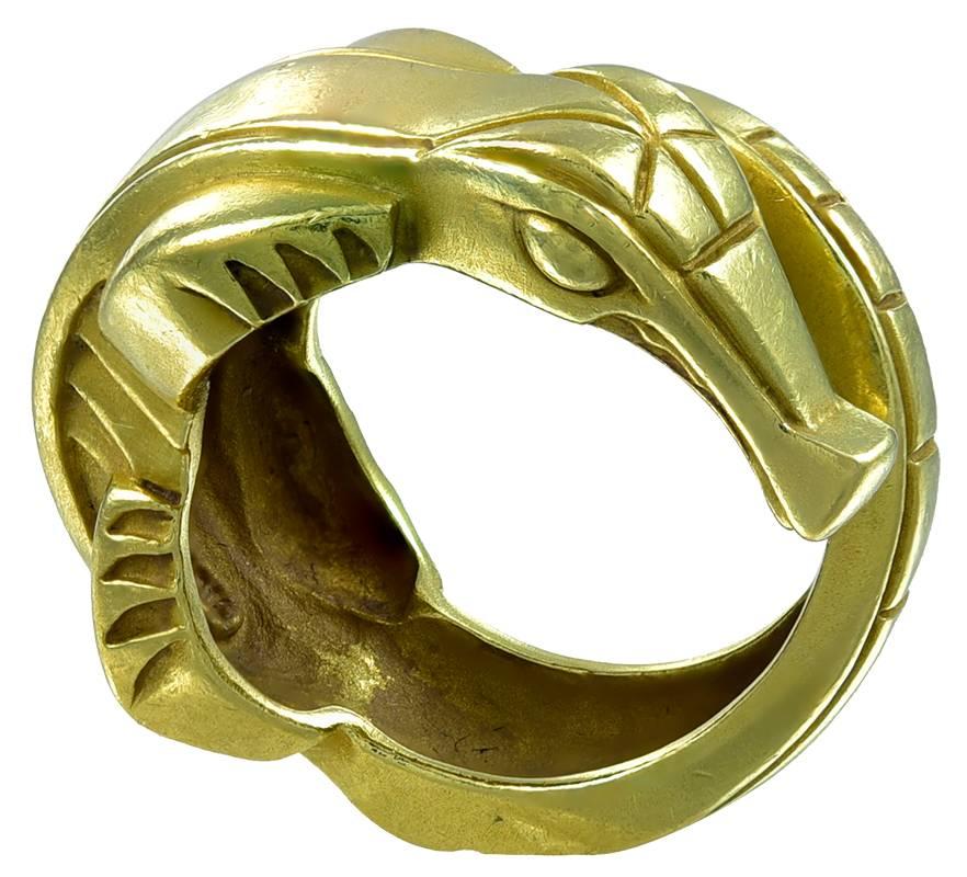 An unusual concept Ring which is dramatic on the finger and comfortable to wear. Because the Alligator is not joined at the tail, the size can be easily altered 
by a jeweller. In the inner shank are the following marks: 
B KIESELSTEIN-CORD  2000 