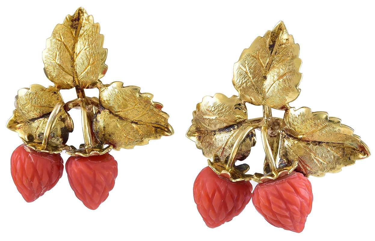 The Corals carved as Wild Strawberries and the leaves and stems are in 14K Gold. Well made and attractive on the ear and should you wish, a post can be soldered on for wearing as a pierced earring. The reverse stamped 585 (14K) on the clips and with