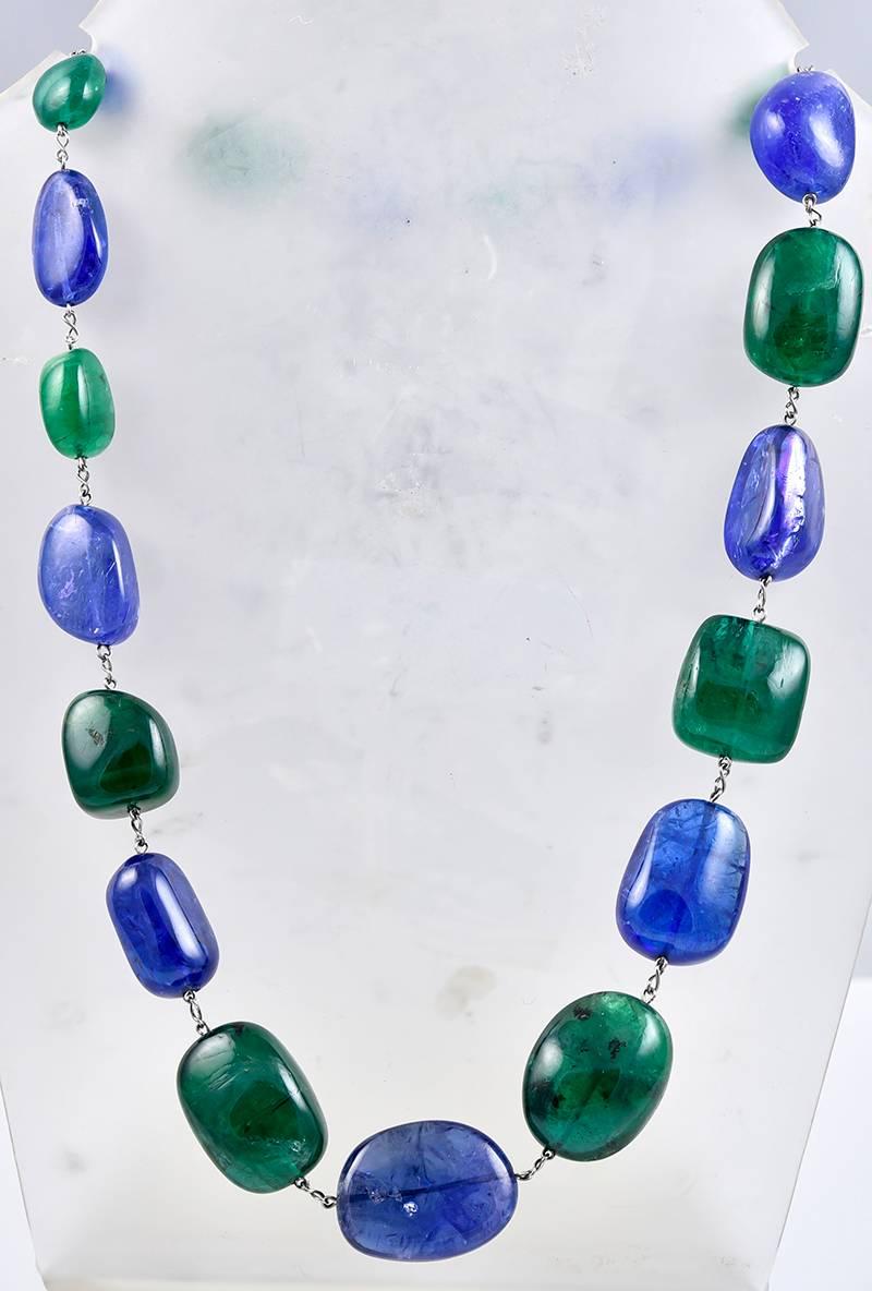 A stunning 225 carats of tumbled Tanzanite pebbles and 200 carats of tumbled Emerald pebbles, all joined with Platinum connections and the clasp hidden away in the top Emerald pebble.
A wonderful, head turning two colour combination for the woman