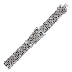 A Woven 18kt White Gold Bracelet with Baguette Diamond Fittings