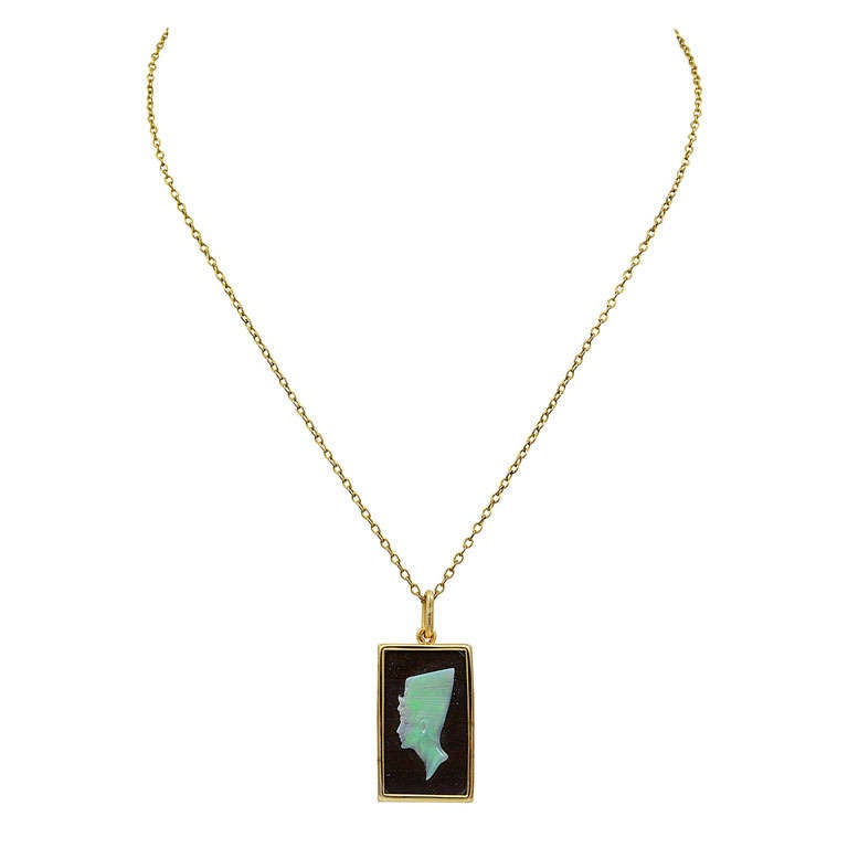 A small Carved Opal Pendant of Queen Nefertiti