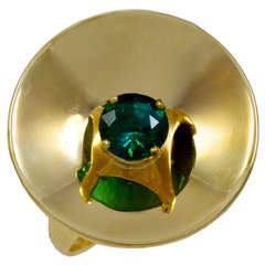 Gold concave dish shaped Ring centrally set with a glowing Green Tourmaline