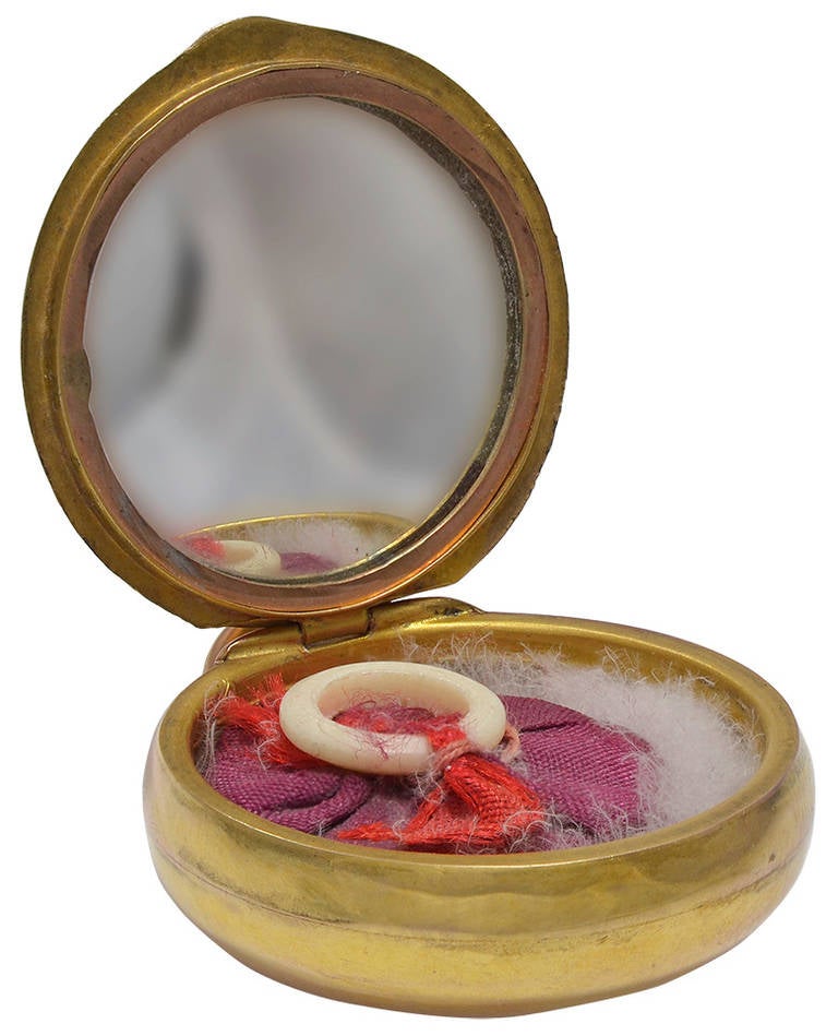 A Gold Powder Puff pendant Locket at 1stDibs