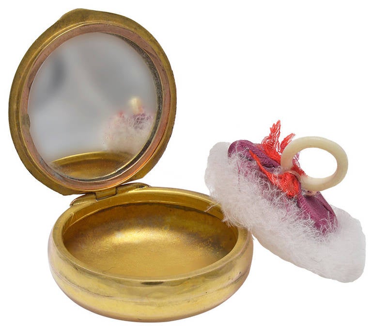 A Gold Powder Puff pendant Locket at 1stDibs