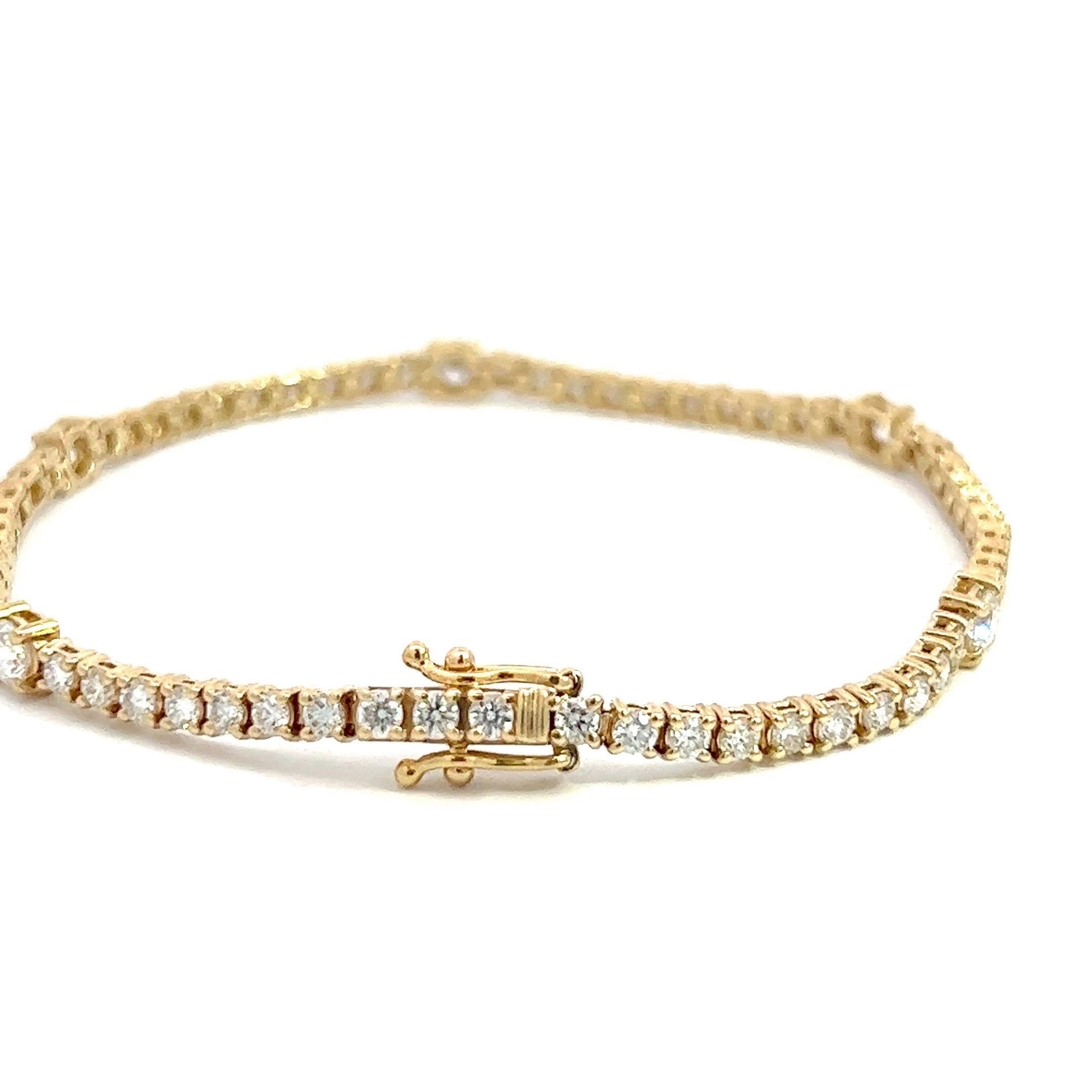 14k Yellow Gold Tennis Bracelet with 5 Bigger Diamonds and a Unique Look For Sale 1