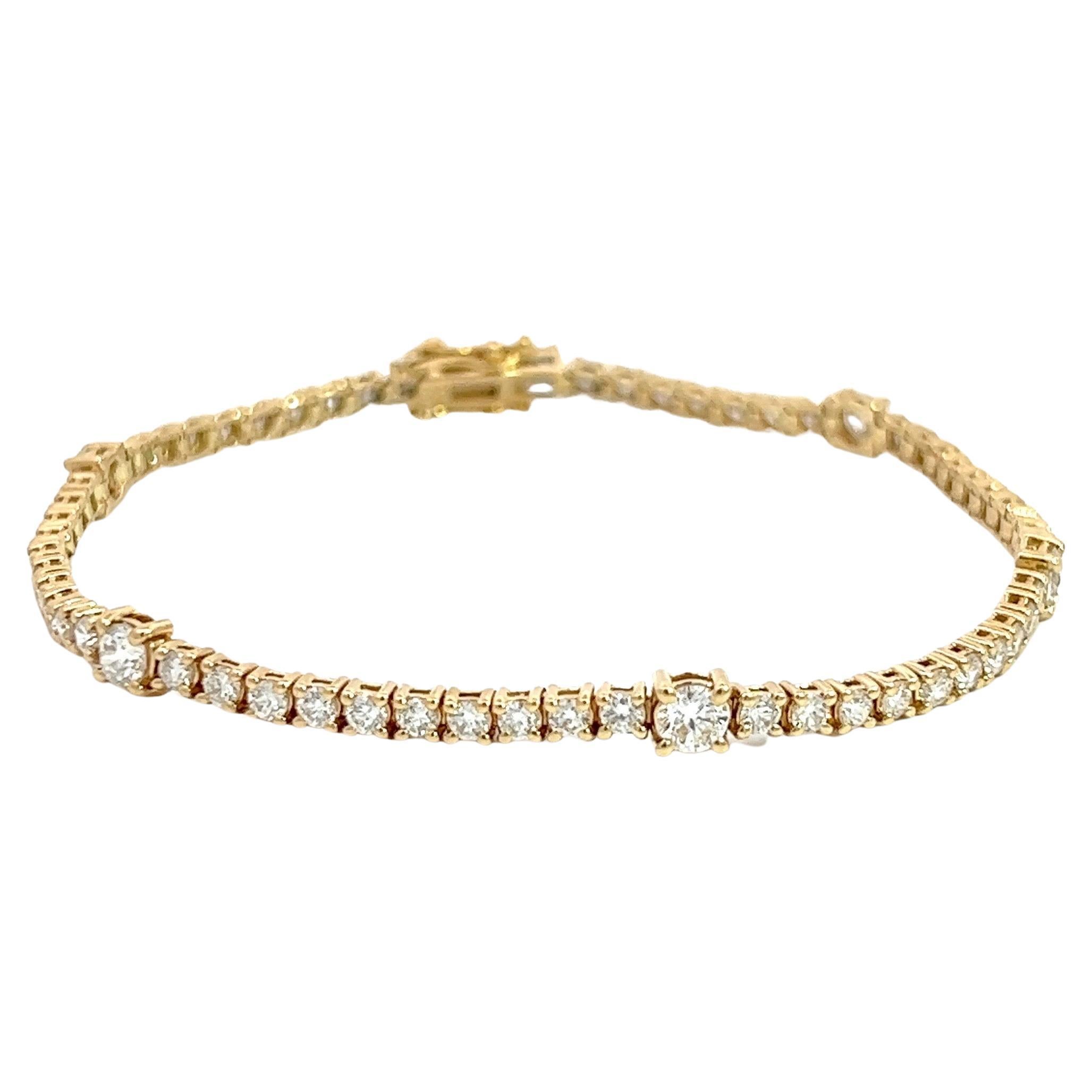 14k Yellow Gold Tennis Bracelet with 5 Bigger Diamonds and a Unique Look For Sale