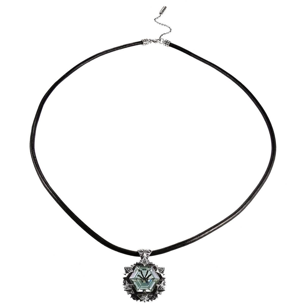 This unique Thoscene Green Amethyst Silver Joy Pendant Necklace features a green amethyst stone set in sterling silver and was designed to evoke joy in one's life. All of the pieces, including this pendant necklace, in John Brevard’s Thoscene