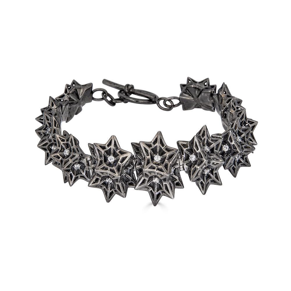 This unique black sapphire and black ruthenium bracelet is meant to evoke personal power. This limited edition piece is inspired by sacred geometries and patterns in nature. Part of designer John Brevard’s Verahedra collection, this bracelet is