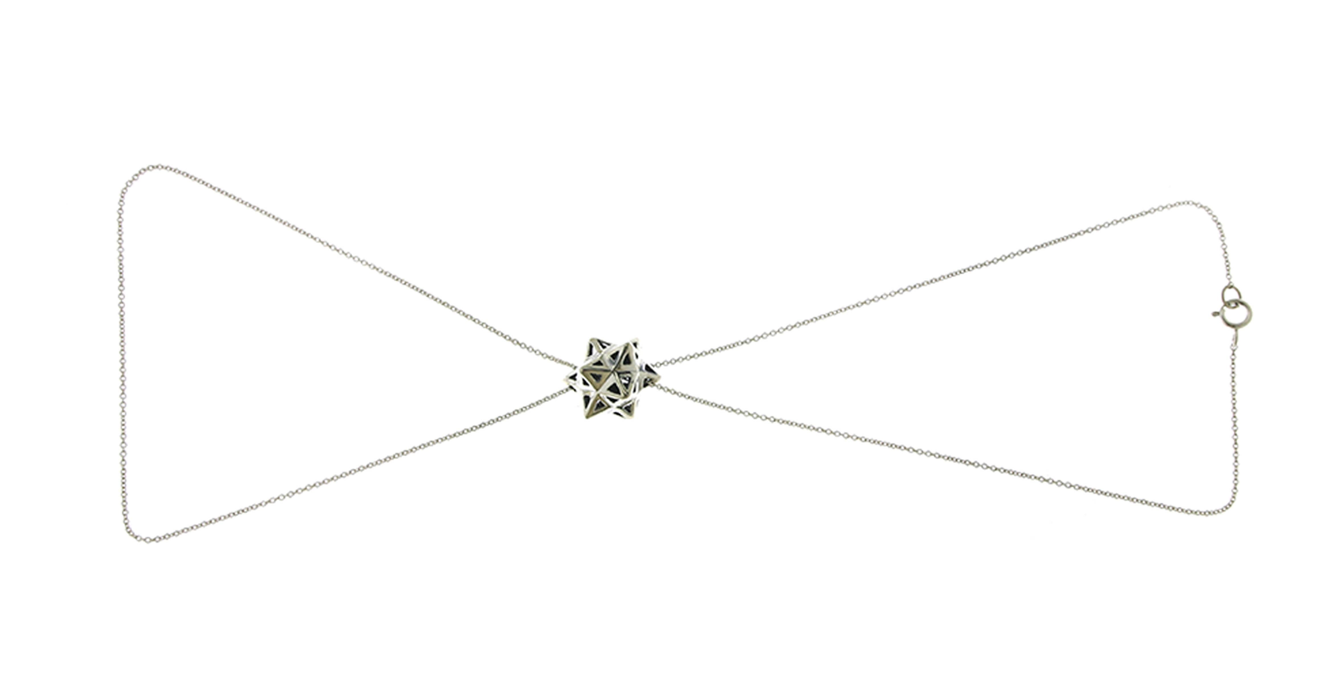 This limited edition, sterling silver Framed Mini Tetra necklace is an embodiment of monumental power and strength. This necklace features sacred geometric forms and evokes personal power. This necklace is part of designer John Brevard’s Verahedra