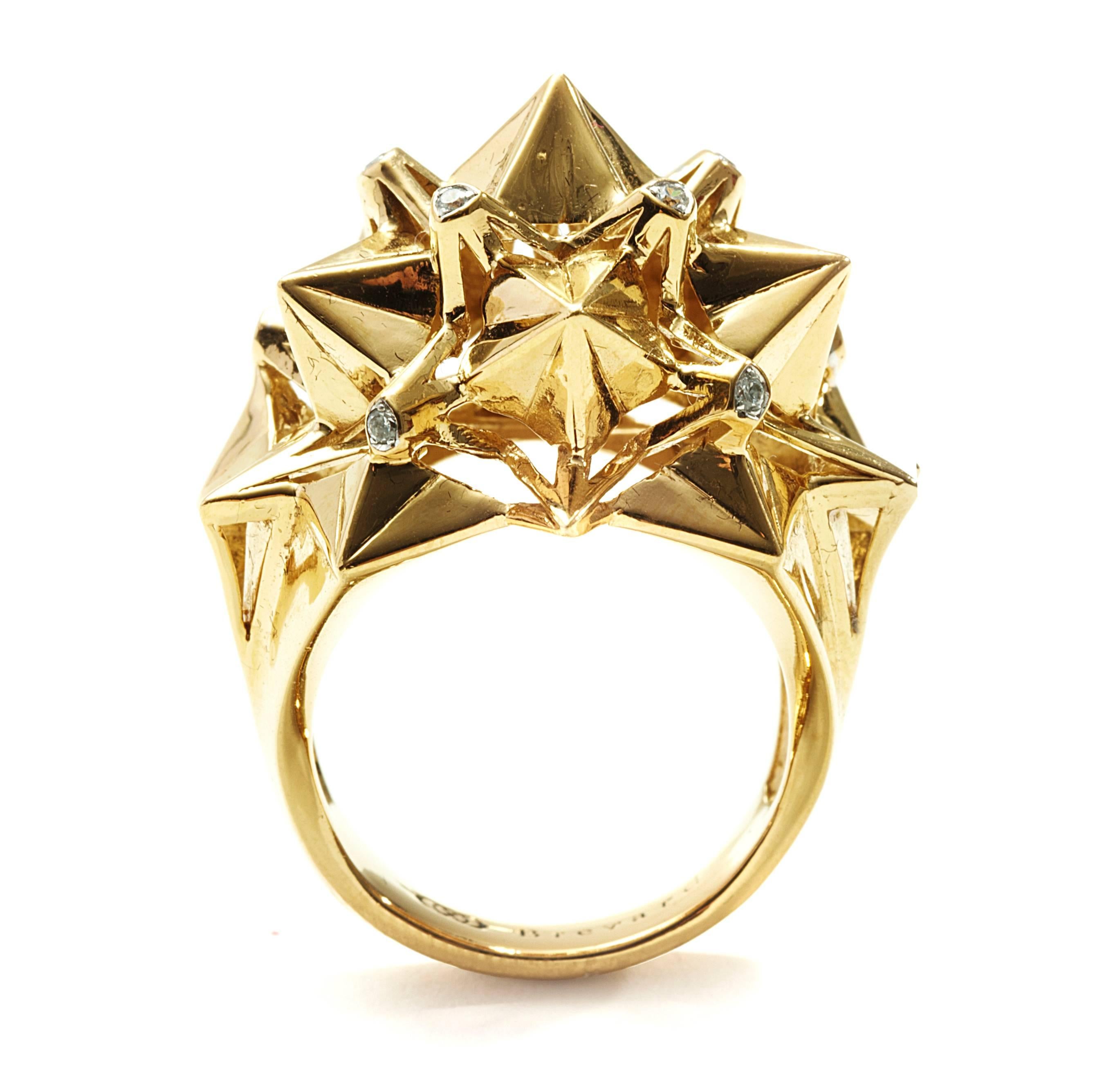 This Nova 18K Gold and Diamond Ring is a statement of strength and power. Designer John Brevard used principles of sacred geometry to design these earrings for optimal strength and energy-capture. This piece is limited edition and designed for the