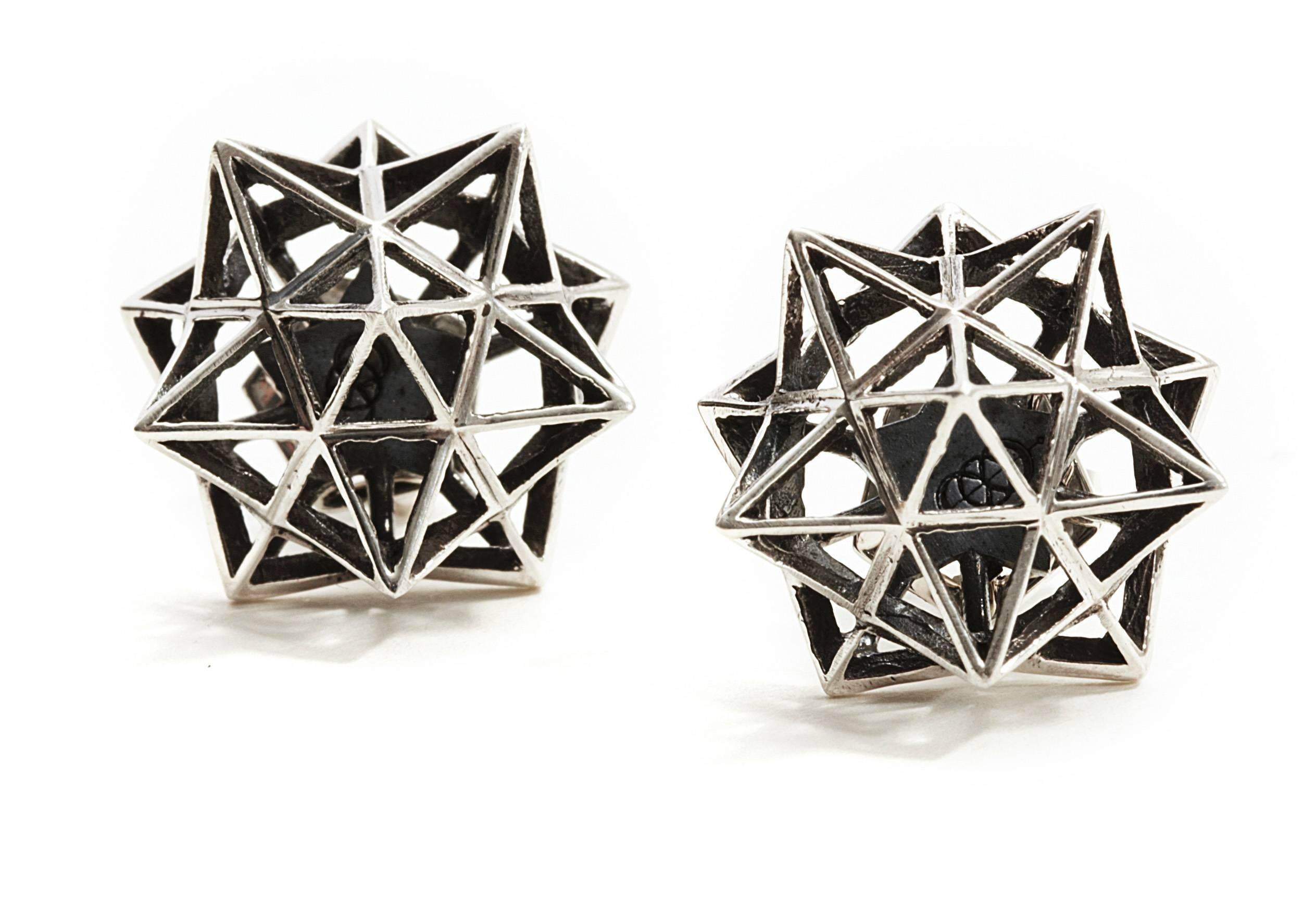 Verahedra collection stud earrings in sterling silver. These airy sculptural earrings by John Brevard are inspired by sacred geometry, namely the Star Dodecadron. The Dodecahedron represents an idealized form of divine thought, will, or idea. To