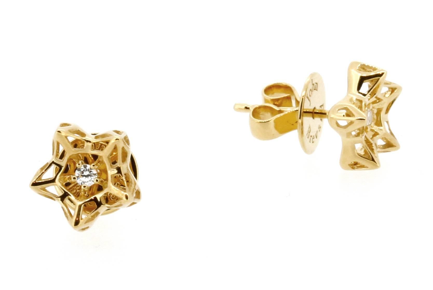 These limited edition, Mini Tria Frame Diamond and 18K Gold Stud Earrings sparkle with strength. These statement earrings represent exploding stars, with a sparkling diamond in the center. This limited edition piece is inspired by sacred geometries