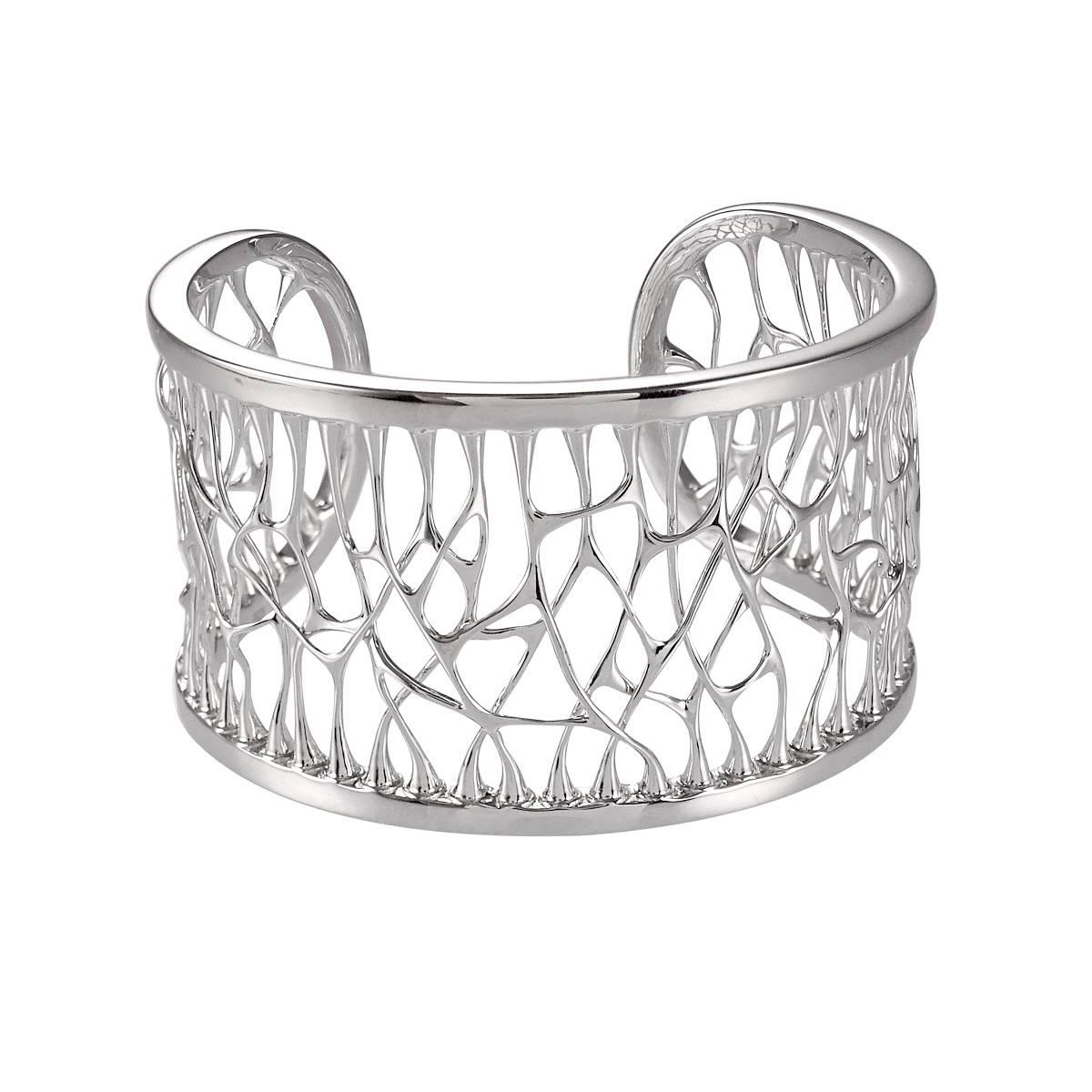 This is a Morphogen collection cuff in sterling silver.

The Morphogen Collection is Composed organic shapes that are morphogenic in nature, abstract, pulled, and stretched into a fluid form.

This piece represents our fluidity.

This piece