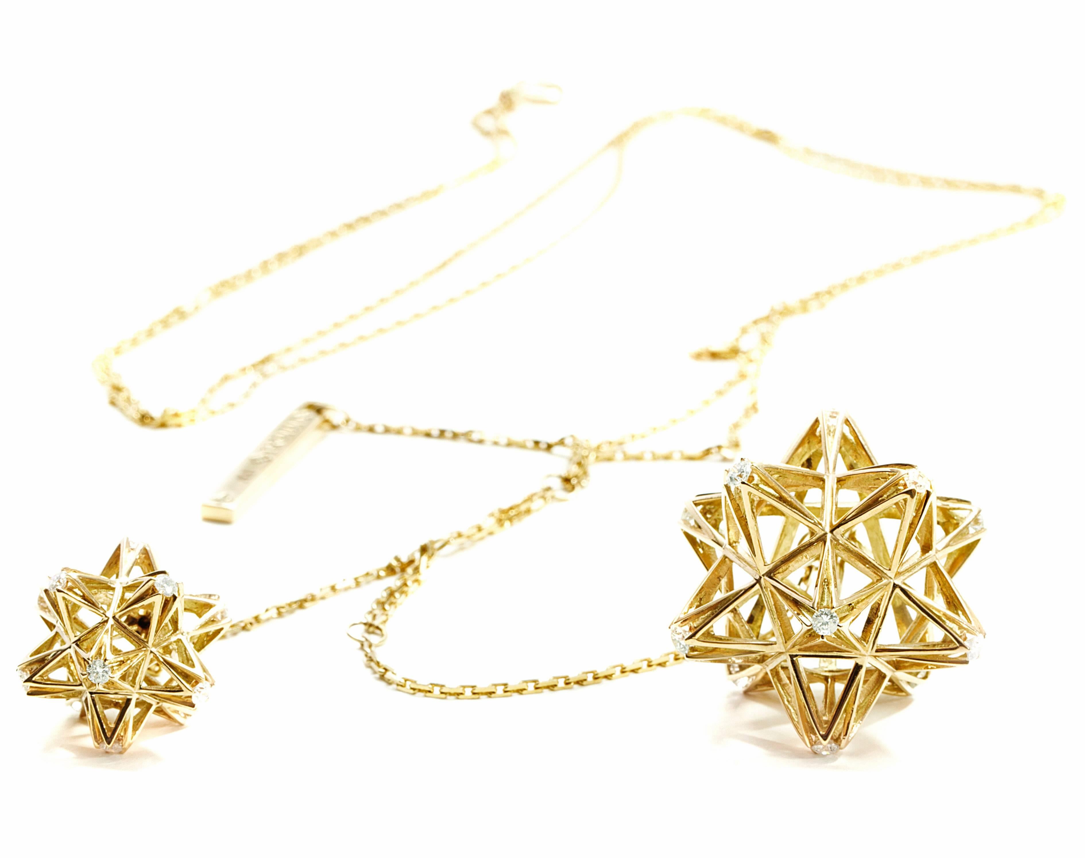 This limited edition Frame Diamond and 18K Gold Pendant Necklace sparkles with strength. This star dedecahedron is a powerful geometric shape. It is inspired by sacred geometry and was created to provide a powerful force for your journey through