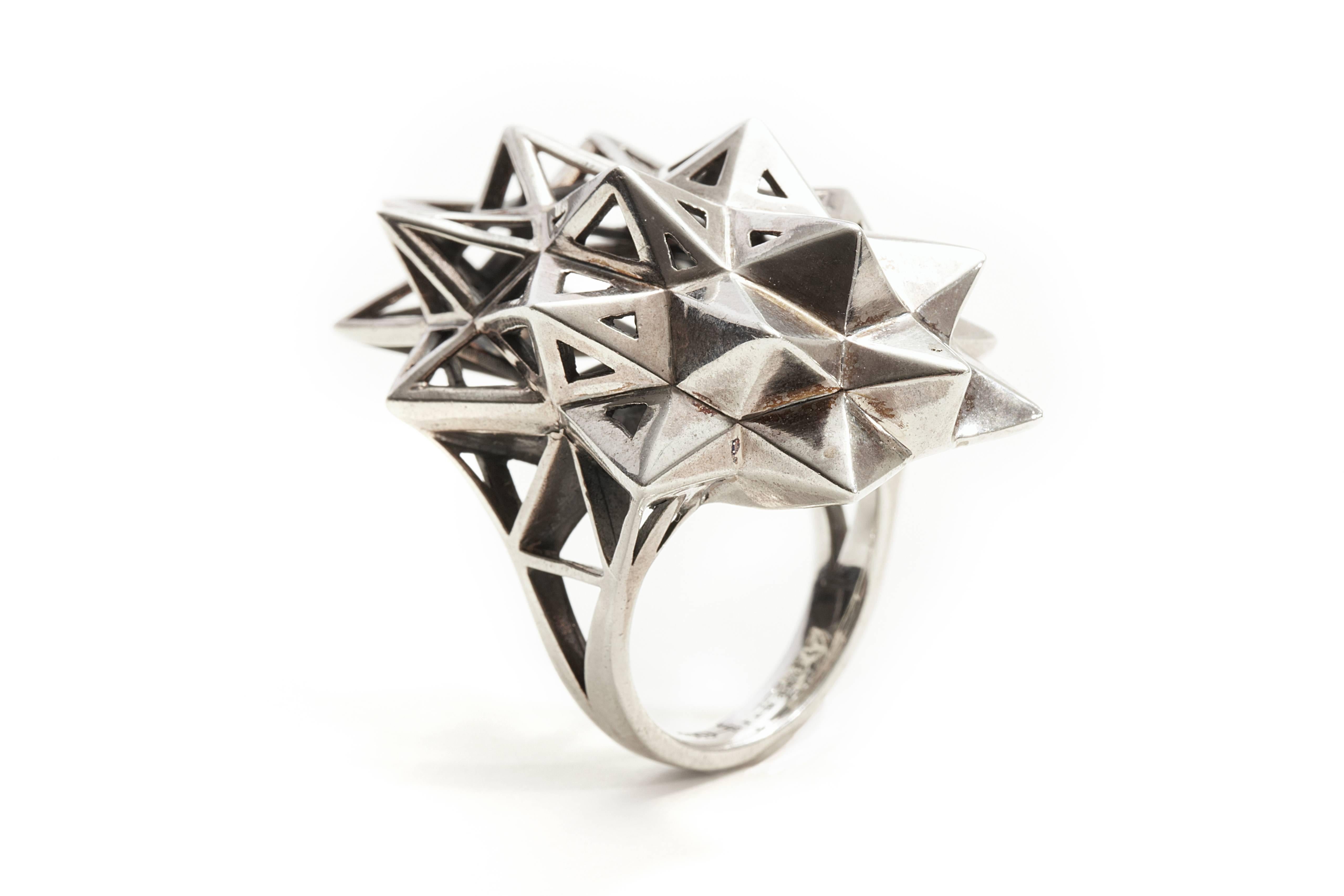 This limited edition, Sterling Silver Stellated Star Ring is an embodiment of monumental power and strength. The shield-like design of this ring protects and empowers the wearer. This ring features sacred geometric forms and evokes personal power.