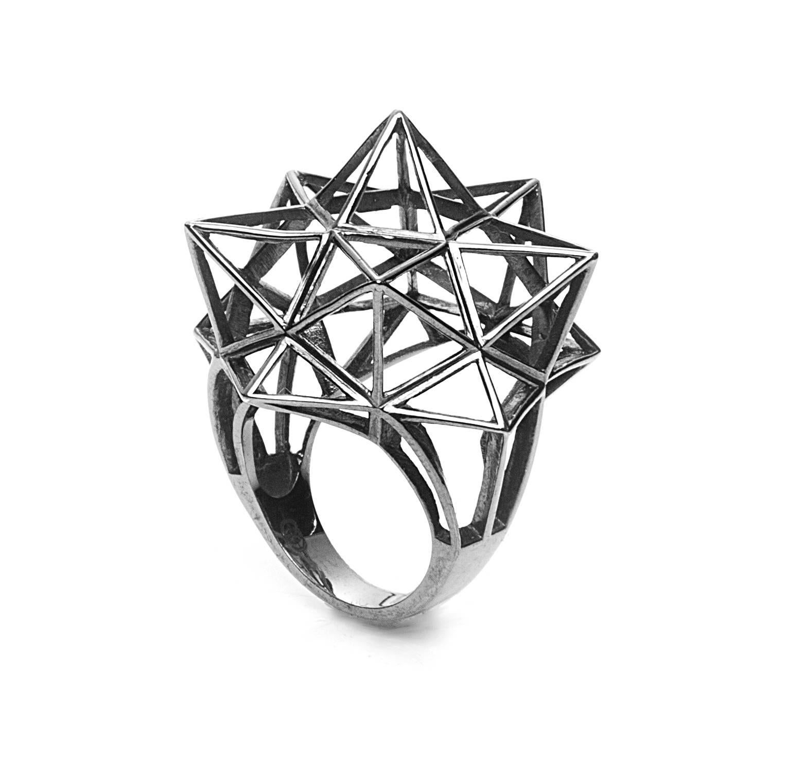 This Sterling Silver Framework Star Ring is a statement of strength and power. Designer John Brevard used principles of sacred geometry to design this ring for optimal strength and energy-capture. This piece is limited edition and designed for the